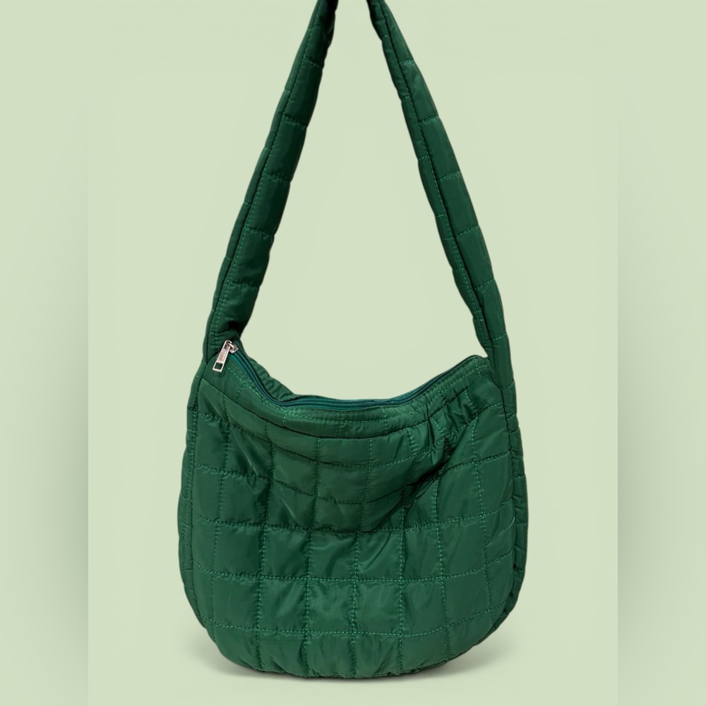 Green quilted medium sized puffer bag